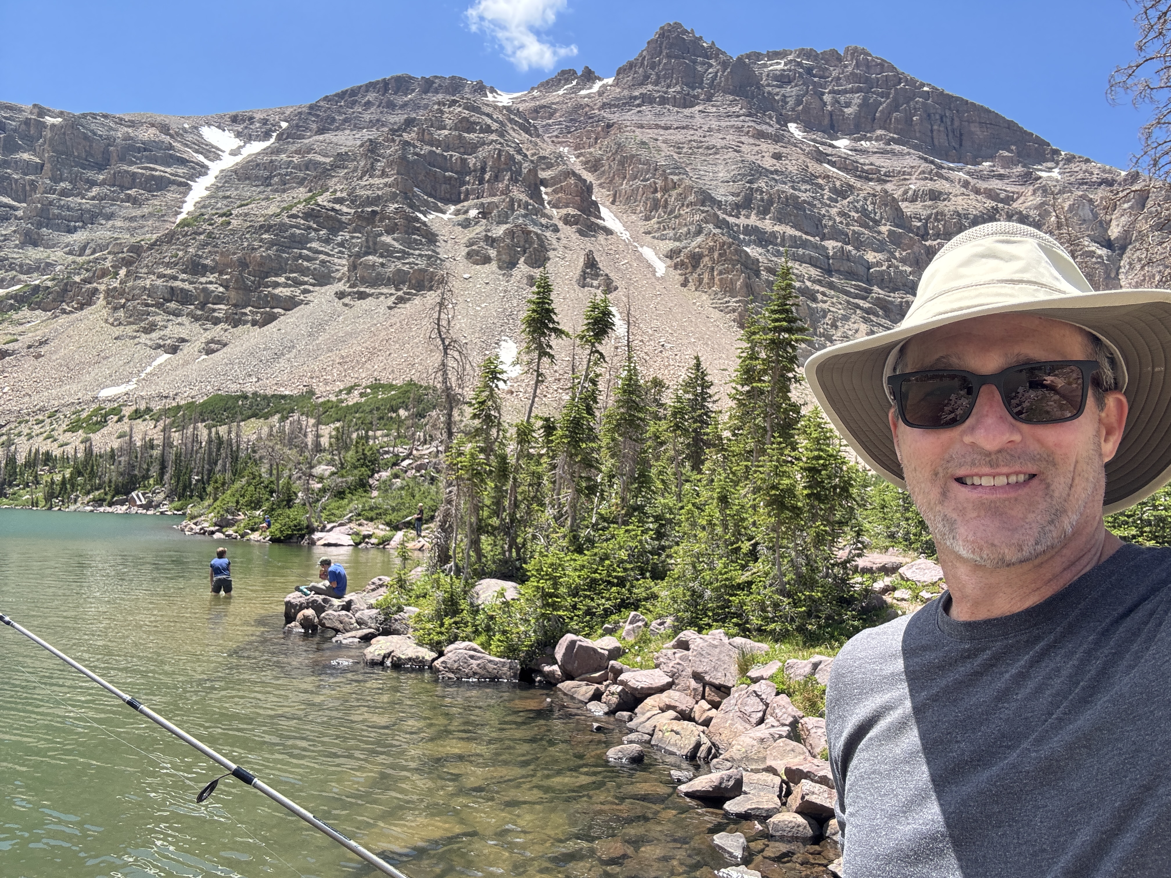 Jed Taylor fishing an alpine lake